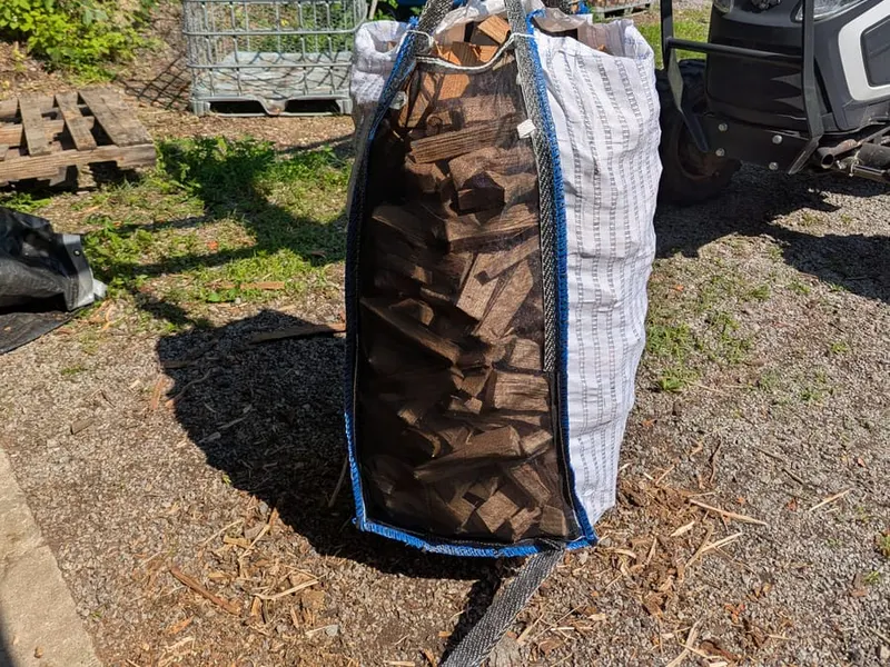 A freshly cut, weighed bulk bag of Martin Woodworking wood on the scale