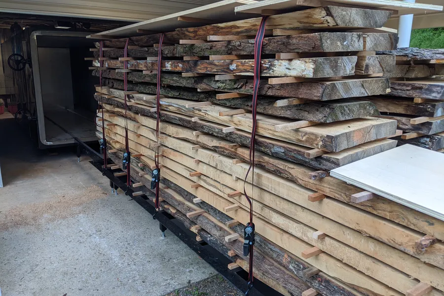 Hardwood slabs being loaded into the iDry vacuum kiln